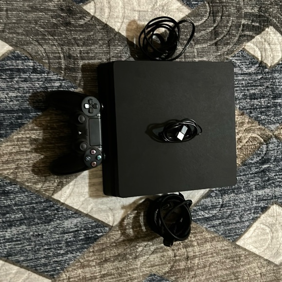 PS4 with the controller and HDMI cable and power cord